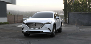 Front view of a white 2021 Mazda CX-9. | Mazda dealer in St. Louis, MO.
